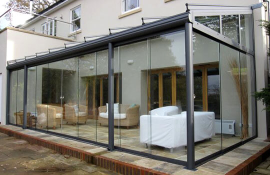 glass room on paved patio