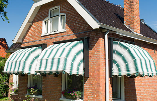 dutch canopys covering house windows