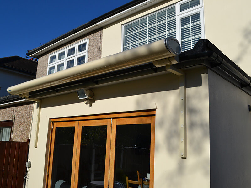 retracted awning in back garden