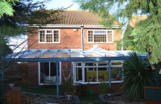 glass dutch canopy in garden