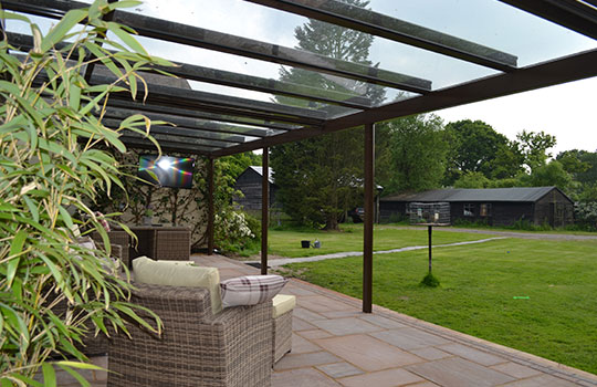 glass roof protecting patio