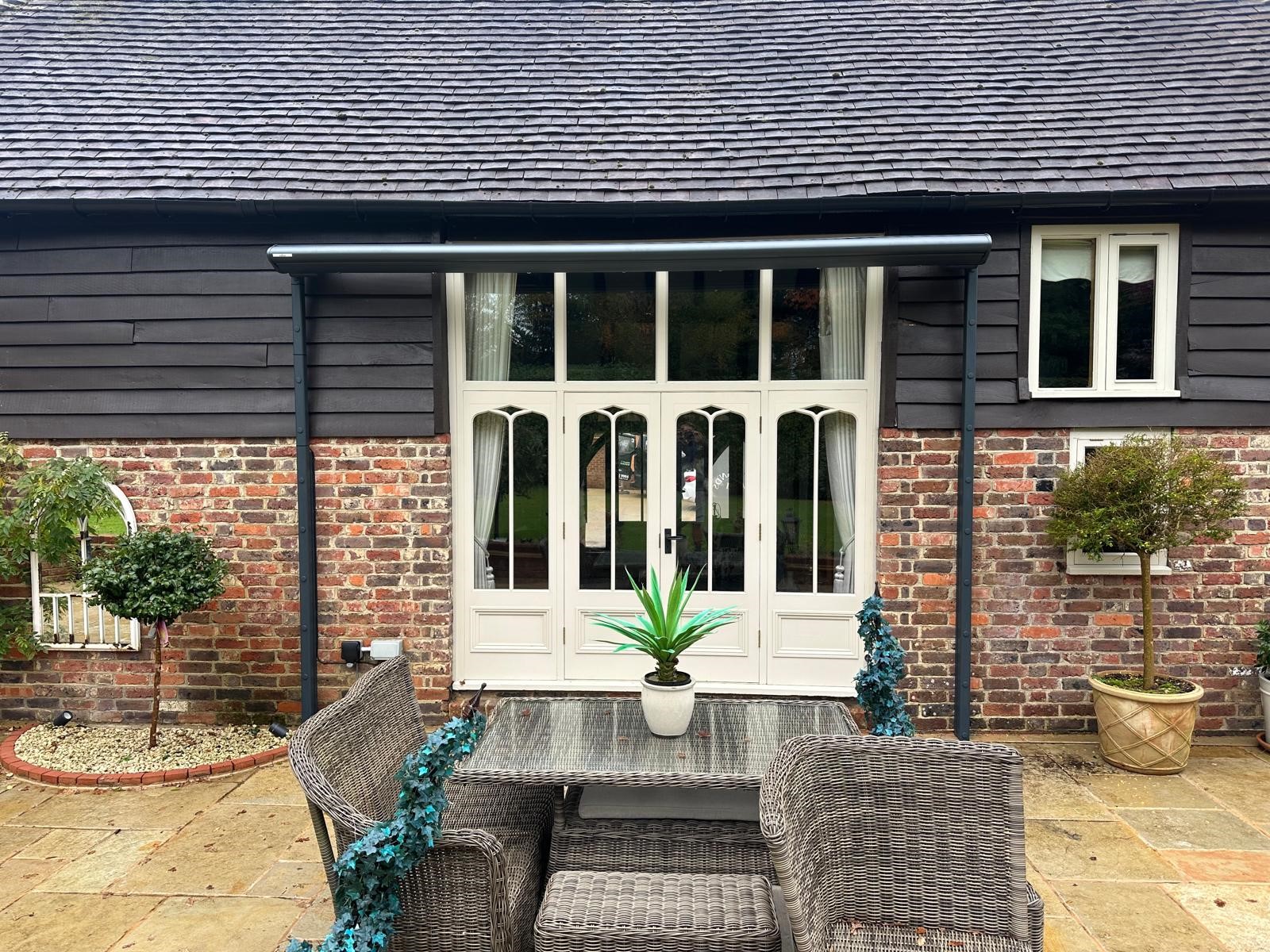 free standing awning by entrance porch